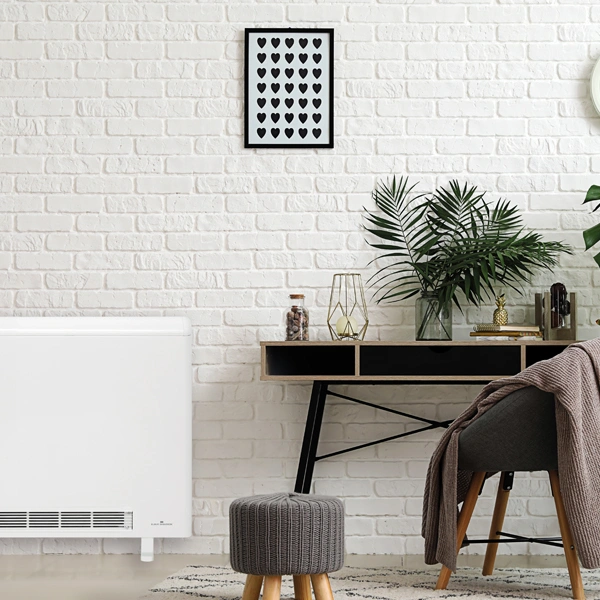 Elnur ECOHHR PLUS Storage Heater installed in a study next to a desk