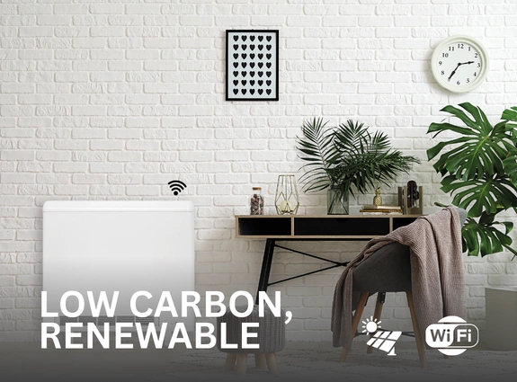 Elnur ECOHHR PLUS Storage heater installed in a study next to a desk. The text Low Carbon, Renewable is on the bottom left of the image, with the symbols Wi-Fi and solar compatible on the bottom right.